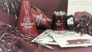 Missouri State spirit pom poms and misc folders and pens
