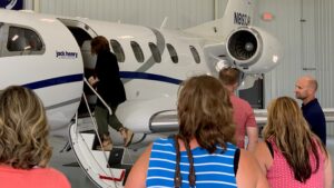 Counselors tour a private airport