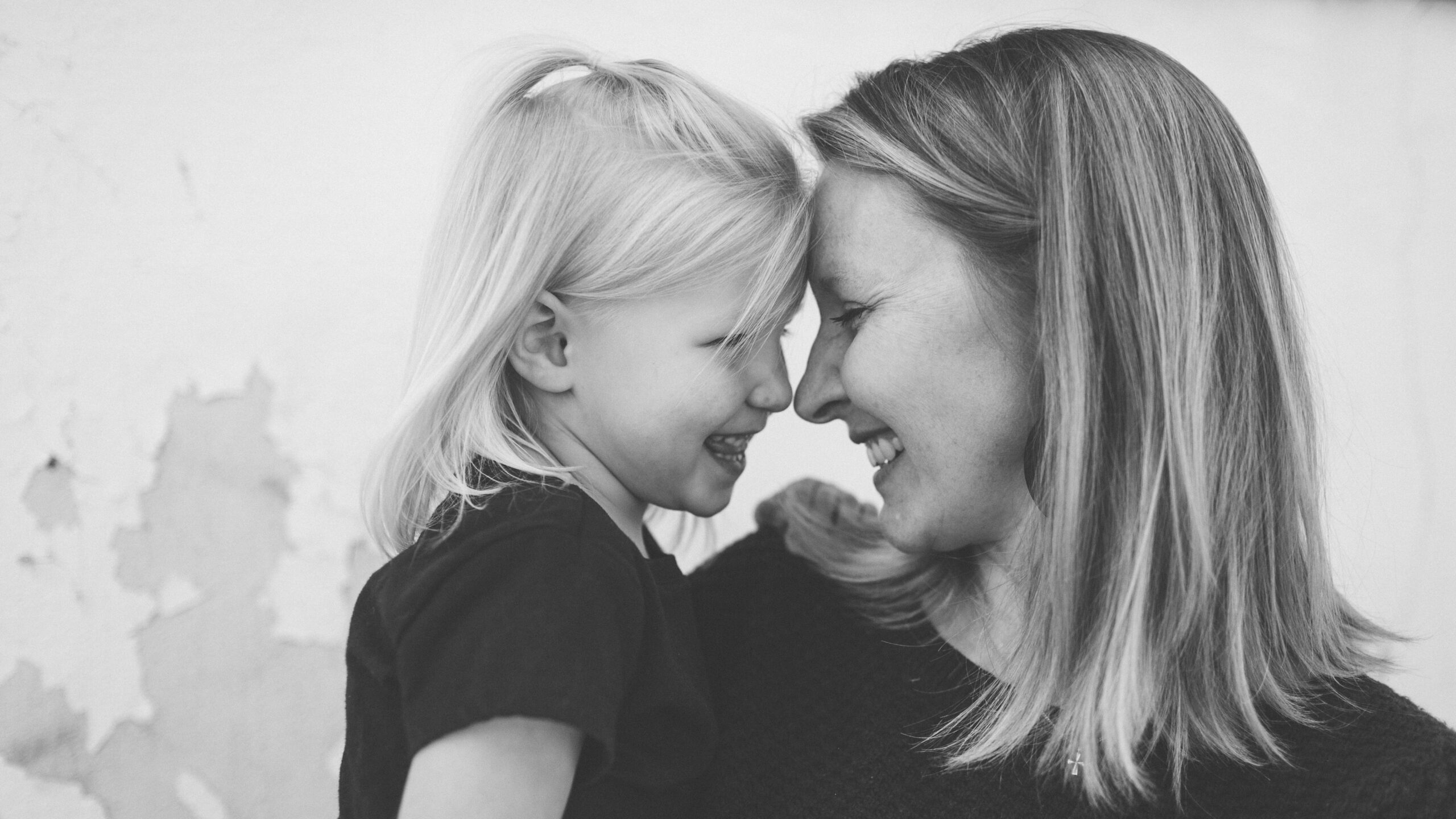 Dr. Sarah Baker giggles with her daughter.