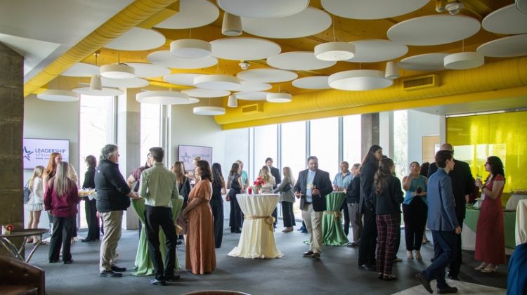 Guests interact at the Leader's Lounge event.