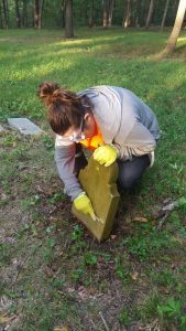 Student from Billie Follenbee’s Basic Conservation of Art and Artifacts class from MSU doing restoration to the cemetery.