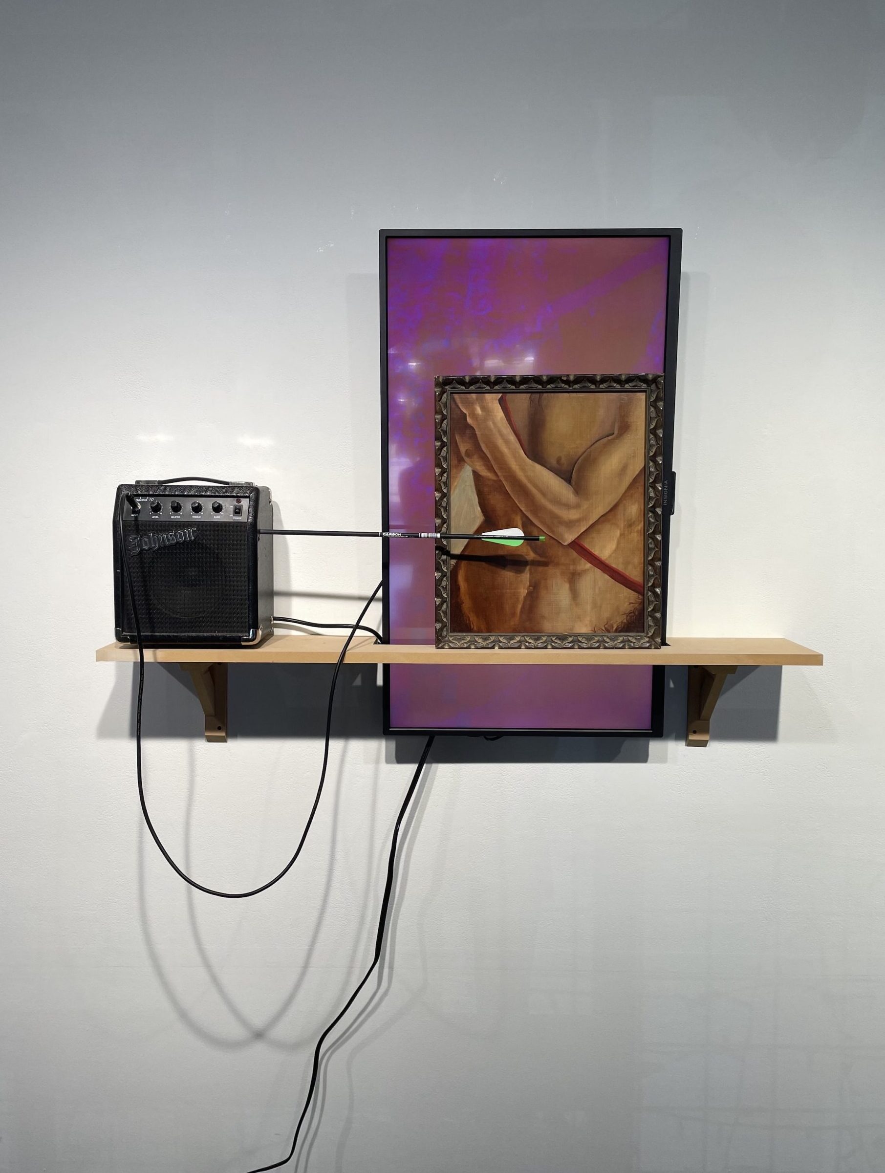 Joe Hedges's "Centaurs" features a guitar amplifier, a television with video, and an oil painting on canvas.