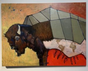 A painting of a buffalo entitled, "When De Hanger Starts" by Vladimir Ramos