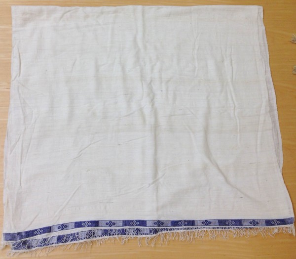 White Rebozo with Blue Tapestry Border Maya culture 20th century Cotton and pigments, L. 2.77 m x W. 1 mm x H. 76.1 cm BFPC collection #2010.5