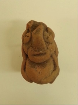 Dwarf Figurine wearing an Animal Mask Olmec culture 1500 B.C.E.-250 C.E. Ceramic, L. 3.1 cm x W. 4.5 cm x H. 5 cm Ralph Foster Museum collection #76.790.121