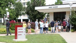 People waiting in line in front of the Missouri State University book store