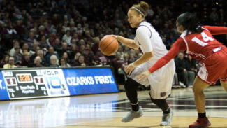 Lady Bears player dribbles the ball