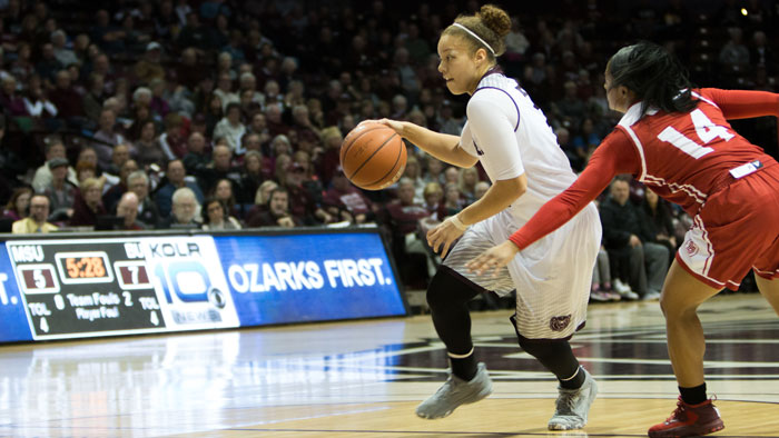 Lady Bears player dribbles the ball