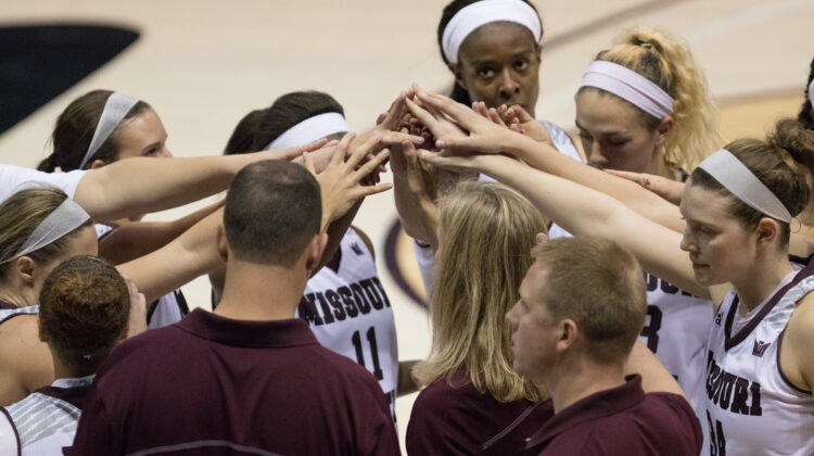 Lady Bears break a huddle