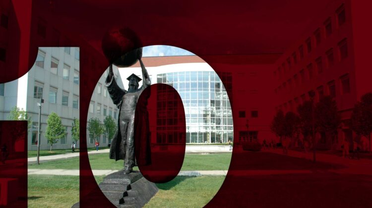Citizen scholar statue masked out by the number ten