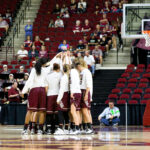 Lady Bears huddle before the game