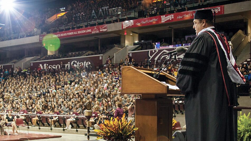 John Goodman speaks to a full JQH Arena during new student convocation