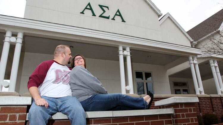 Becky and Ben Gabriel outside the Alpha Sigma Alpha house