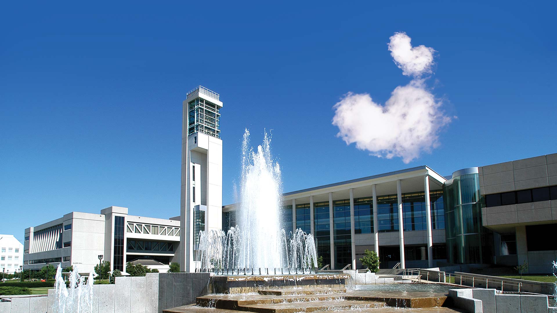Heart-shaped clouds above Hammons Fountain and Meyer Library