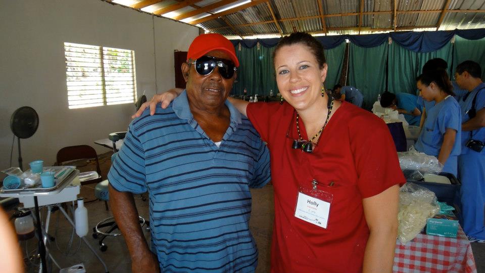 Dr. Ellis in Jamaica with a patient
