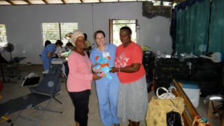 Dr. Ellis in Jamaica with fellow crew members