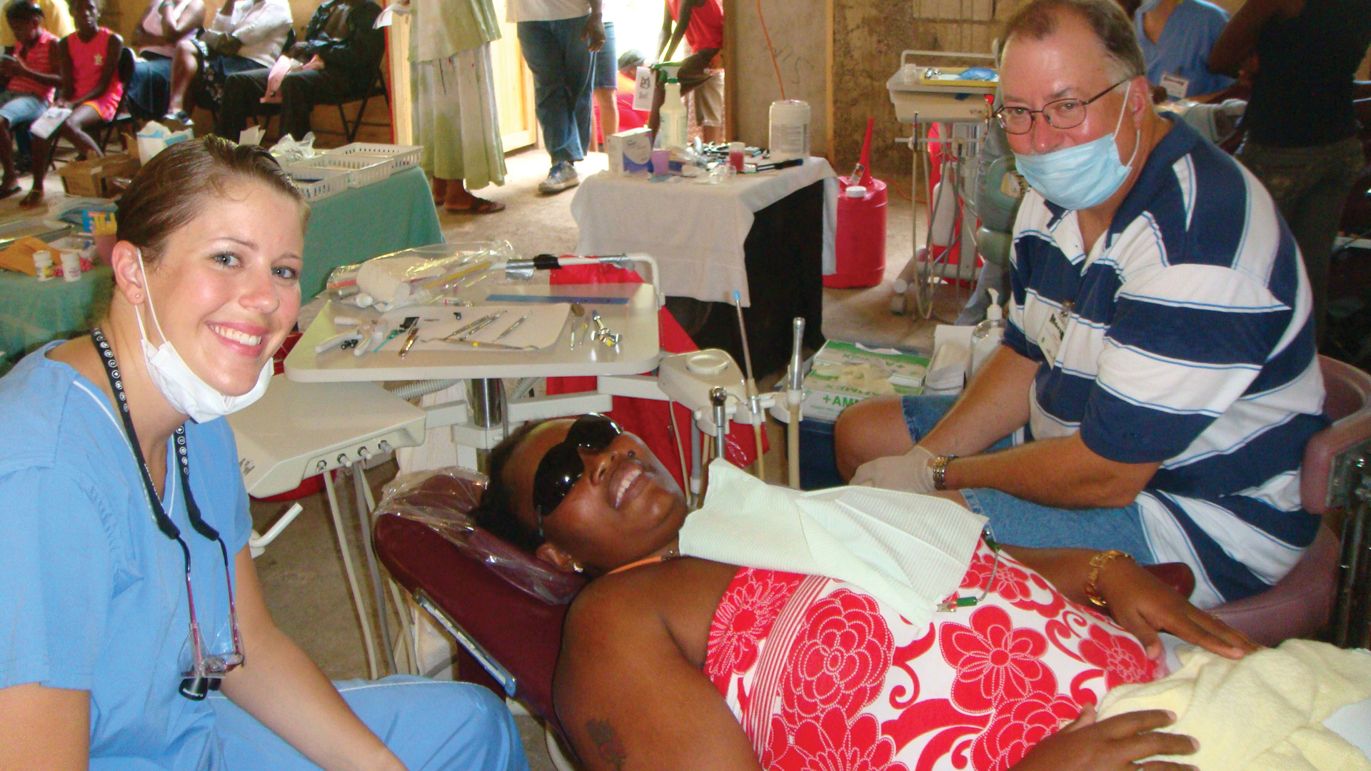 Dr. Ellis with a patient in Jamaica