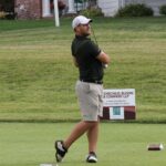 alumni at golf tournament