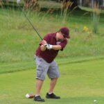 alumni at golf tournament