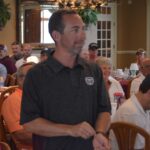 alumni at golf tournament