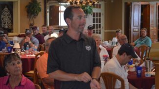 alumni at golf tournament