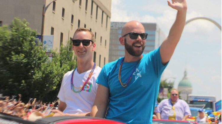 Andrew Shaughnessey rides in Pride parade