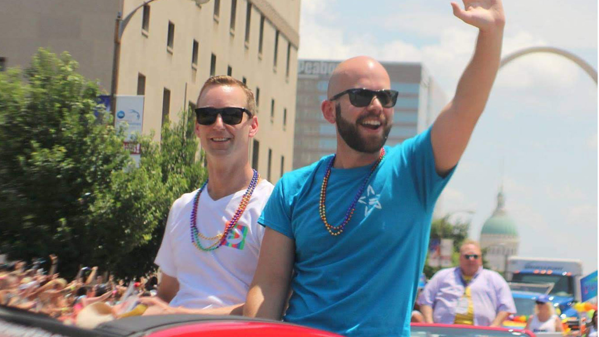 Andrew Shaughnessey rides in Pride parade