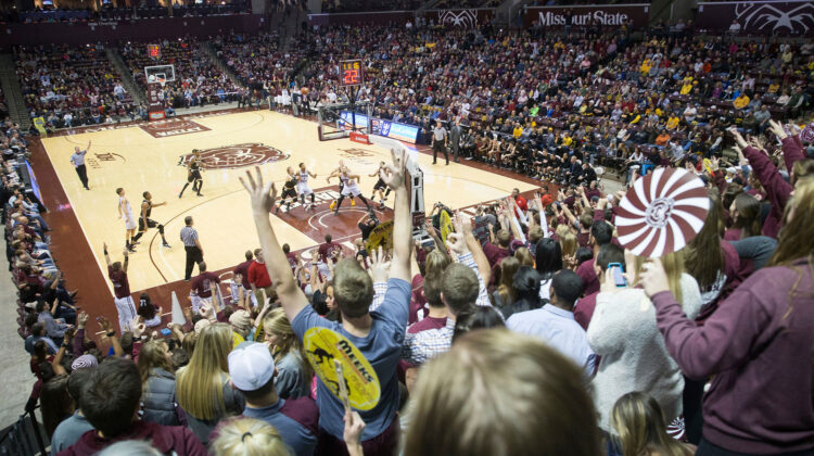 fans cheering at JQH arena