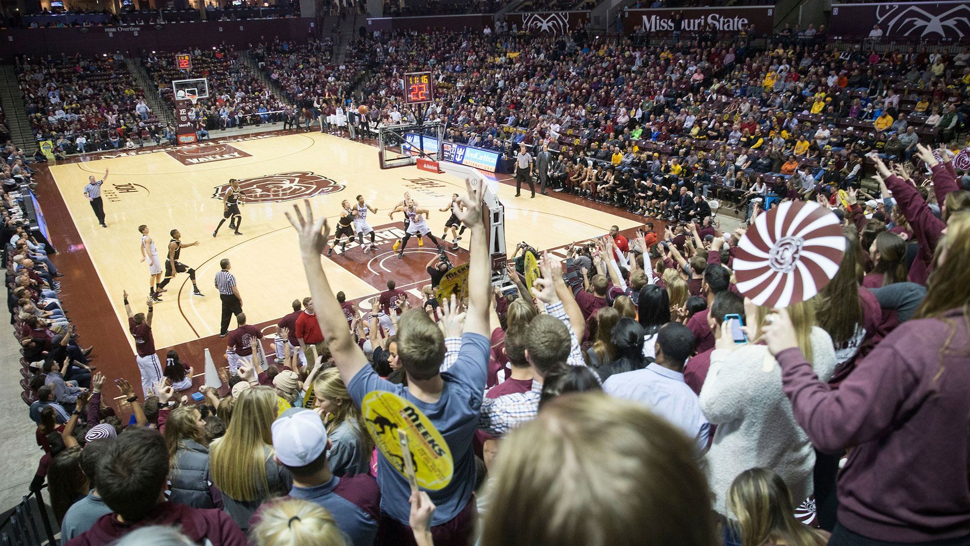 fans cheering at JQH arena