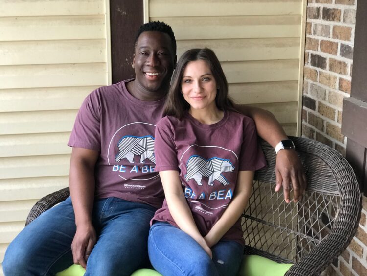 Nii and Rachel pose in their 2017 be a bear shirts