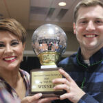 eric straub and trish childers-steckrider smile with trophy