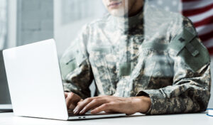 Military person on laptop