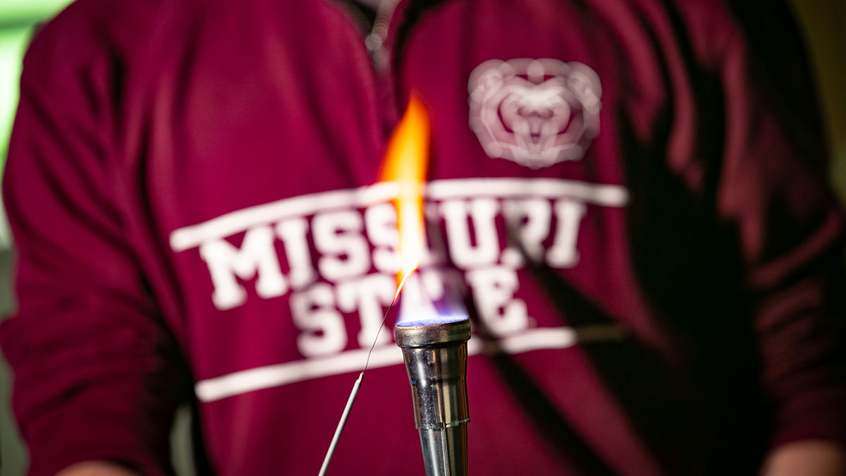 biology student ignites flame