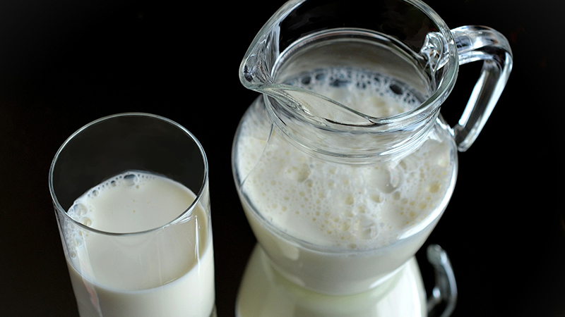 A jar and glass of milk.