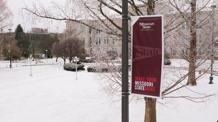 The Missouri State University campus and "Make Your Missouri Statement" maroon banner on a snowy day.
