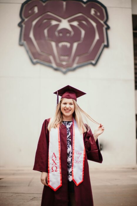 December 2019 graduate Madison Russell in cap and gown