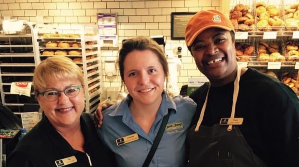 Jennifer Johnson (middle) with coworkers at Panera bakery-café opening.
