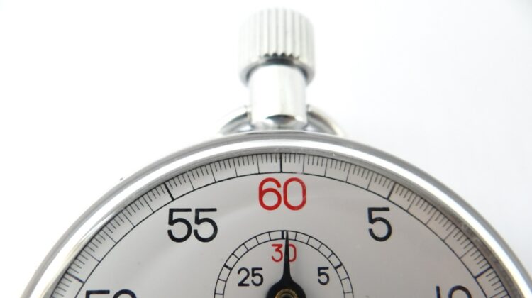 A partial view of a stopwatch timer as it ticks.