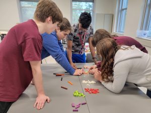 A few participants engage in an activity.