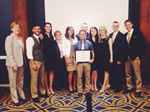 Ad Team students standing with Linda Rozett, Vice President Communications, American Petroleum Institute