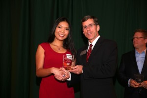 EAC member Brian Hammons, presents Anel Tokayeva with the Outstanding Marketing Student – Exemplifying the Public Affairs Mission award.