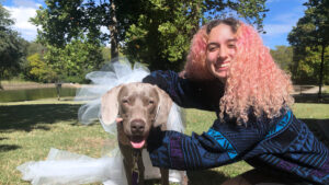 Student Carlea Badolian photographed with rescue dog.