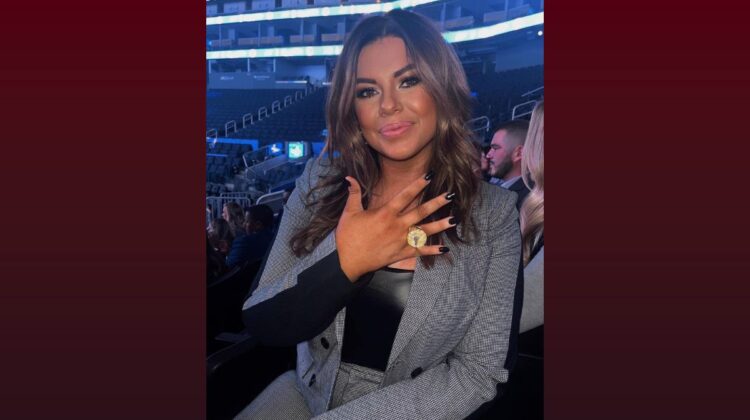 Cassandra Jobe poses with her NBA championship ring.