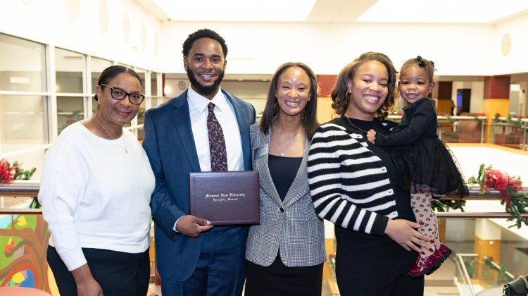 Gerald Schiele at Citizen Scholar award ceremony with his family.