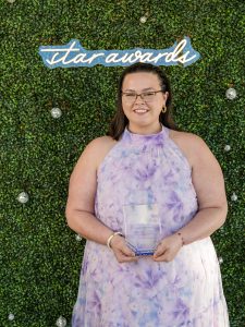 Bekah Gunter with her Outstanding First-Gen Student Award.