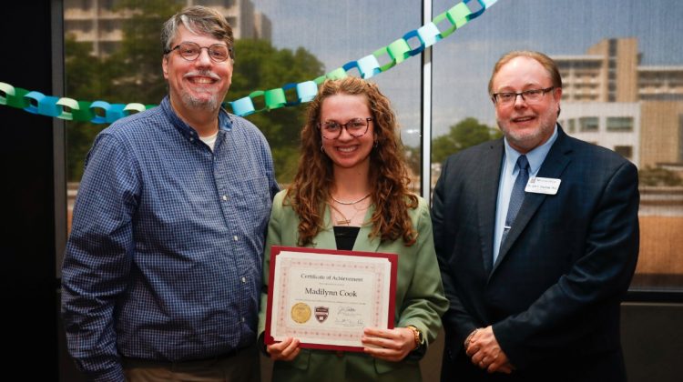 From left to right: Scott Handley, associate director of the Honors College, Madilynn Cook and Dr. John Chuchiak, director of the Honors College.