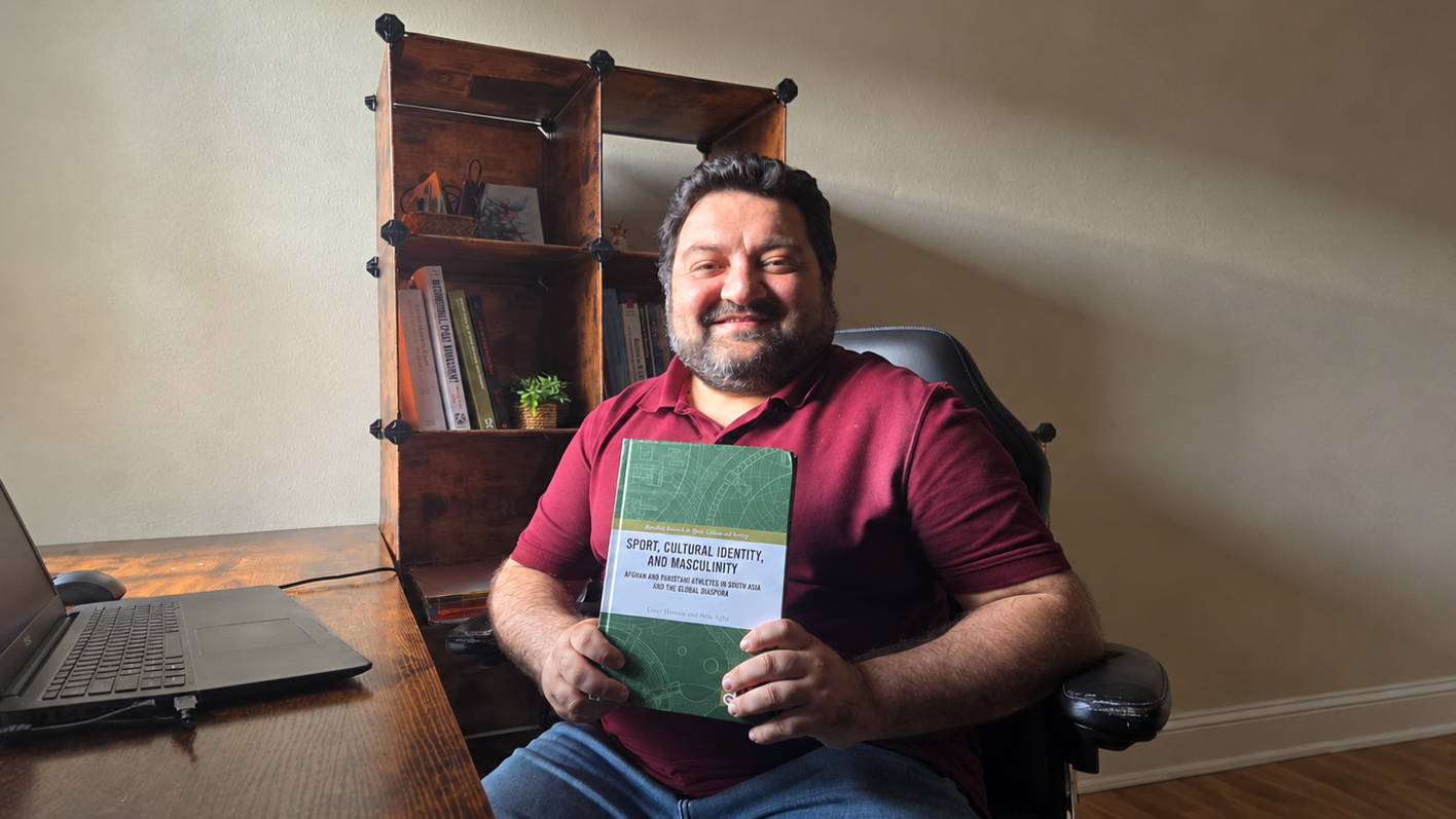 Dr. Umer Hussain with his new book.