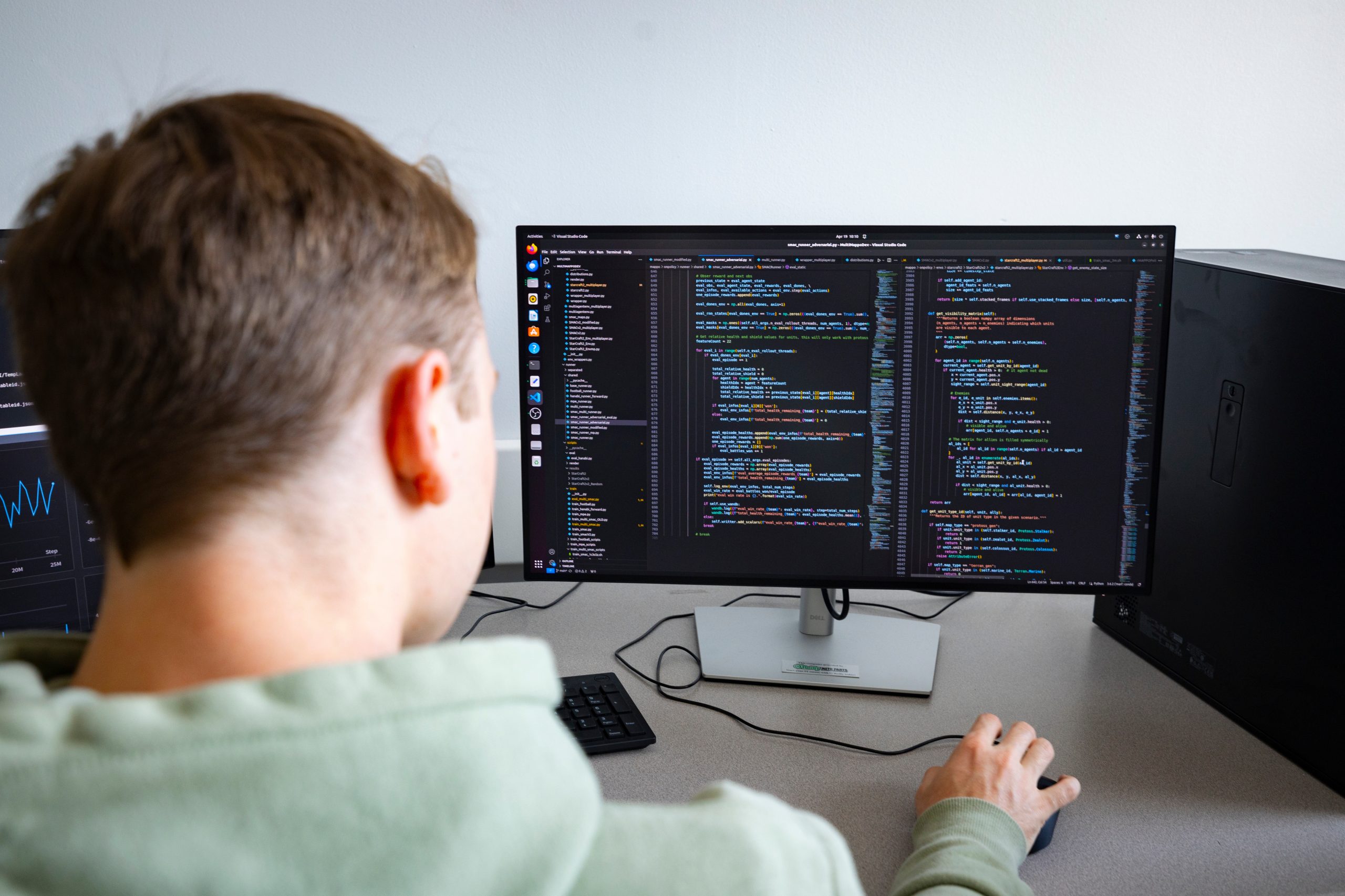 A Missouri State University student working on a computer.