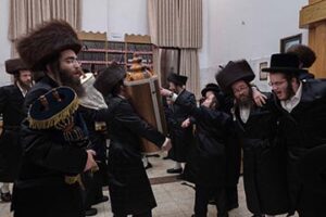 Men participating in a Simchat Torah celebration