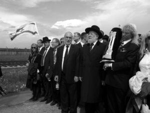 A group marching at Auschwitz in honor of Yom HaShoah